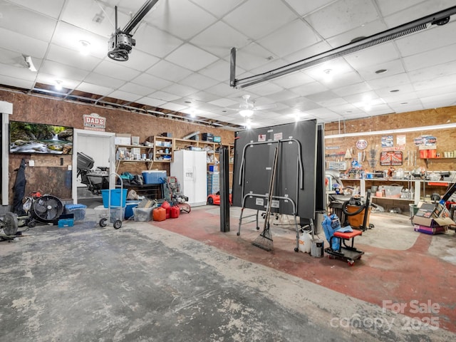 garage with a workshop area