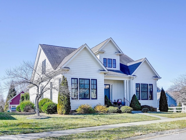 view of front of home with a front yard