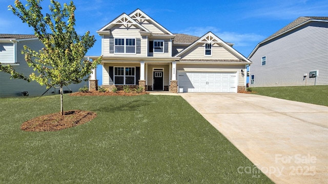 craftsman inspired home with a front yard and covered porch