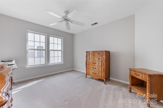 misc room featuring light carpet and ceiling fan