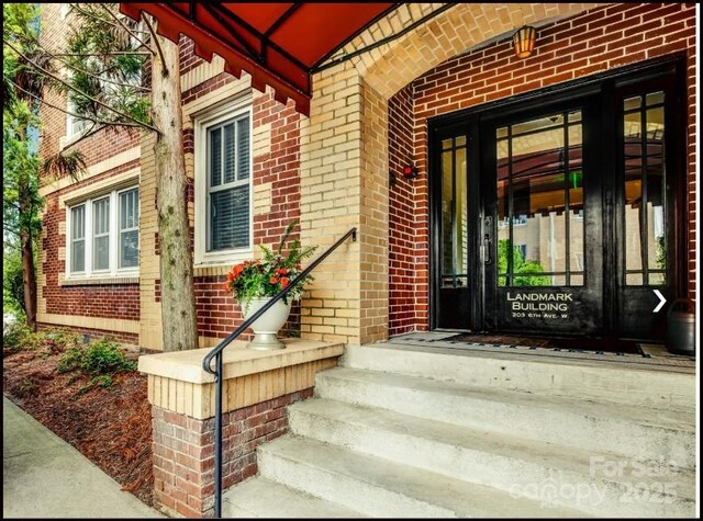 203 6th Ave W Unit 1B, Hendersonville, NC 28739 - entrance to property with brick siding