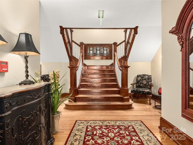 203 6th Ave W Unit 1B, Hendersonville, NC 28739 - staircase with wood finished floors