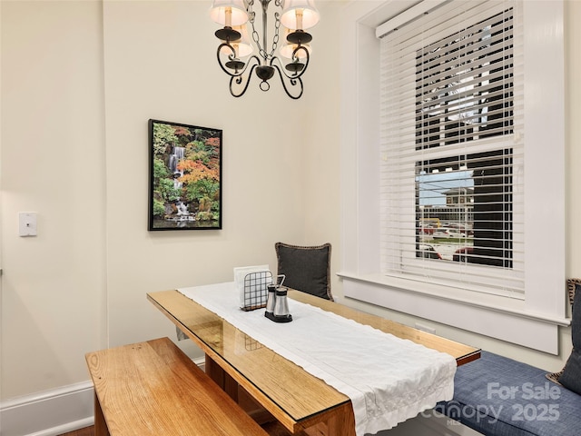 203 6th Ave W Unit 1B, Hendersonville, NC 28739 - dining space with a chandelier