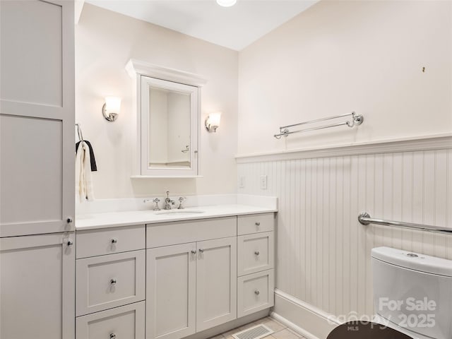 203 6th Ave W Unit 1B, Hendersonville, NC 28739 - bathroom with vanity and wainscoting