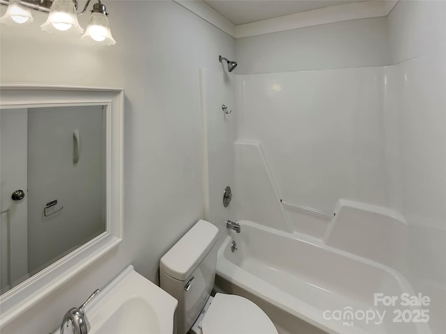 bathroom featuring bathing tub / shower combination and toilet