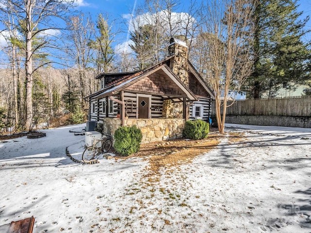 view of snow covered property