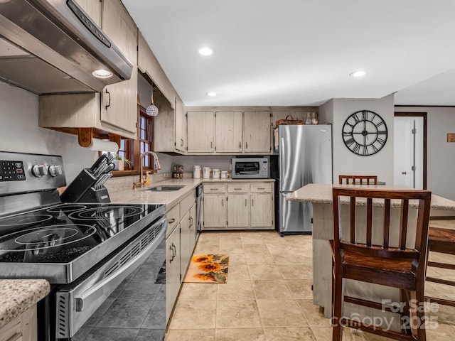 kitchen with stainless steel appliances, range hood, sink, and light tile patterned floors