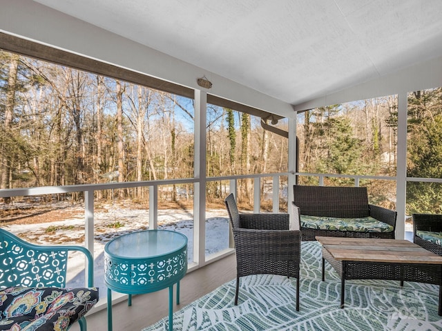 sunroom with vaulted ceiling