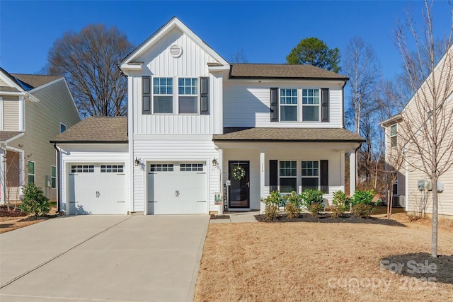 front of property featuring a garage and a porch