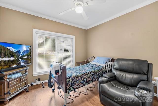 bedroom with ceiling fan, ornamental molding, and light hardwood / wood-style floors