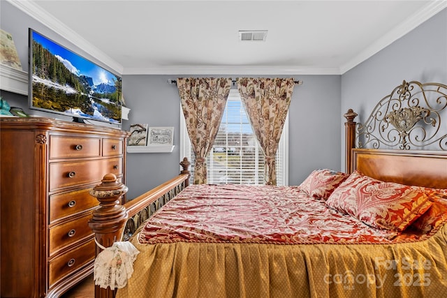 bedroom featuring crown molding