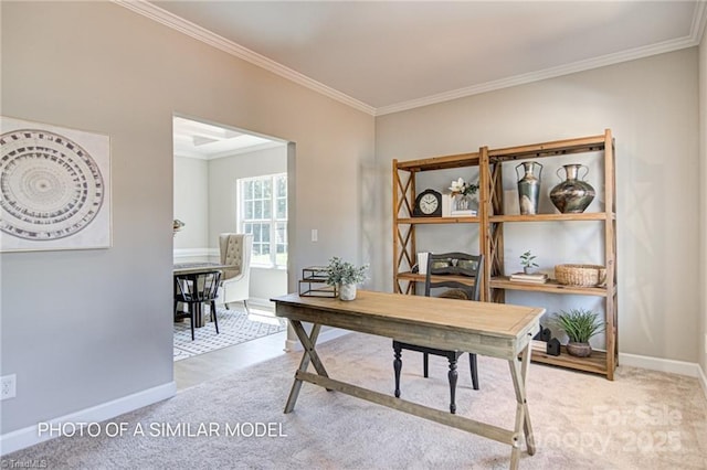 office area with light colored carpet and ornamental molding