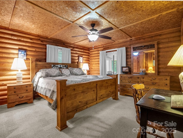 carpeted bedroom featuring log walls and ceiling fan