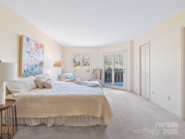 10 Clubside Dr, Asheville, NC 28804 - bedroom featuring access to exterior, carpet flooring, and baseboards