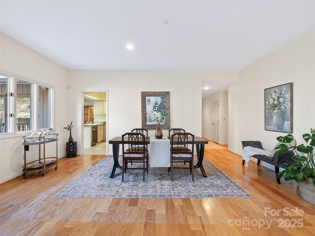 10 Clubside Dr, Asheville, NC 28804 - dining space with light wood-style floors and baseboards
