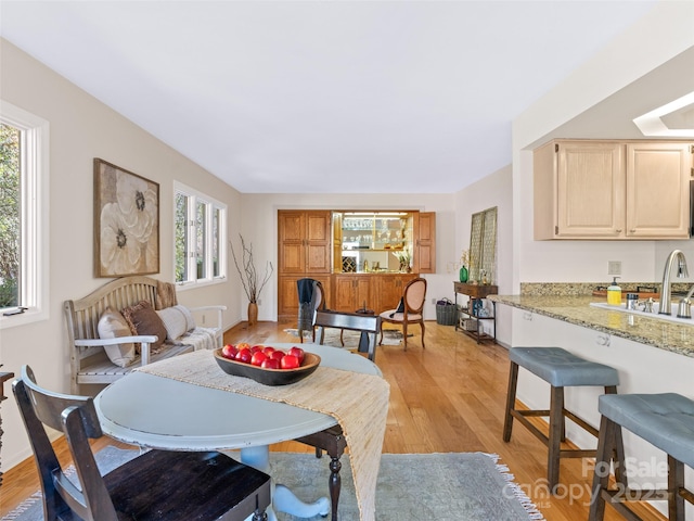 10 Clubside Dr, Asheville, NC 28804 - dining area with light wood-style flooring and baseboards