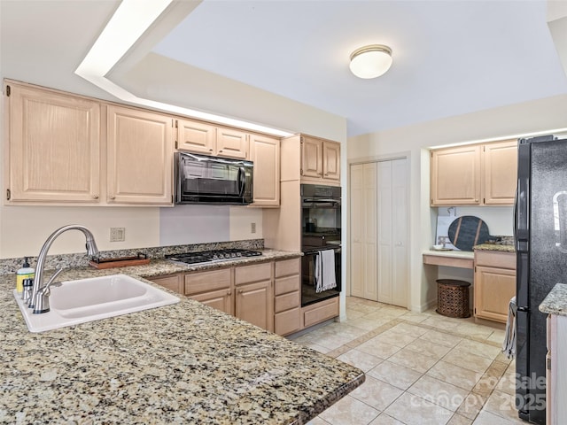 10 Clubside Dr, Asheville, NC 28804 - kitchen featuring a sink, light brown cabinetry, black appliances, and light tile patterned floors