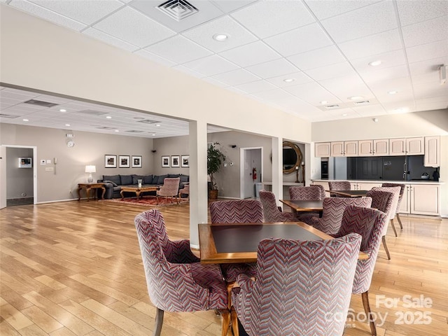 10 Clubside Dr, Asheville, NC 28804 - dining room with light wood-type flooring, a paneled ceiling, visible vents, and recessed lighting