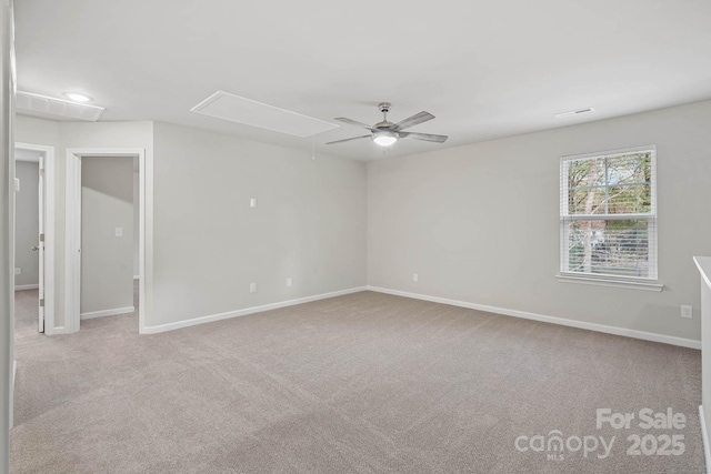 carpeted empty room with ceiling fan