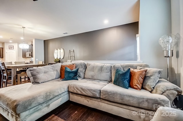 living room featuring dark hardwood / wood-style floors