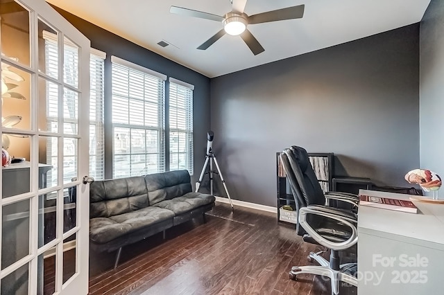 home office featuring ceiling fan and dark hardwood / wood-style flooring