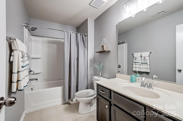 full bathroom with toilet, tile patterned floors, vanity, and shower / tub combo