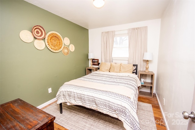 bedroom featuring hardwood / wood-style flooring