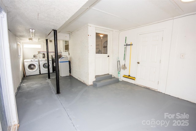 basement with separate washer and dryer