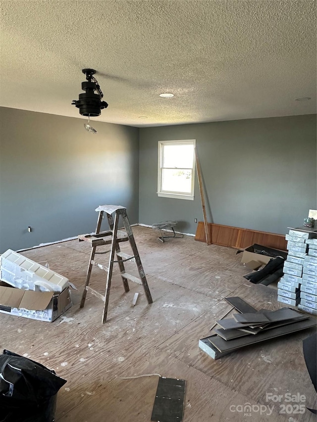 miscellaneous room featuring a textured ceiling