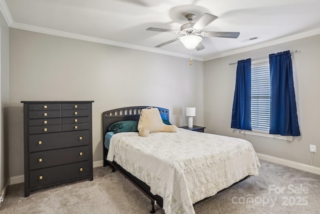 carpeted bedroom featuring ceiling fan and ornamental molding