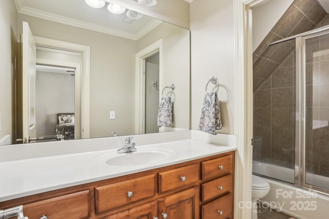 full bathroom with toilet, vanity, shower / bath combination with glass door, and crown molding