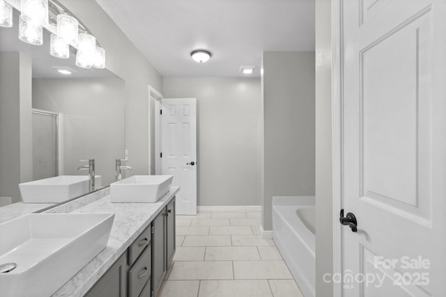 bathroom featuring vanity, separate shower and tub, and tile patterned flooring