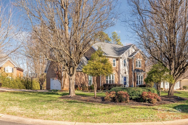 view of front of home featuring a front yard