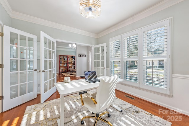 office area featuring ornamental molding, french doors, and light hardwood / wood-style floors