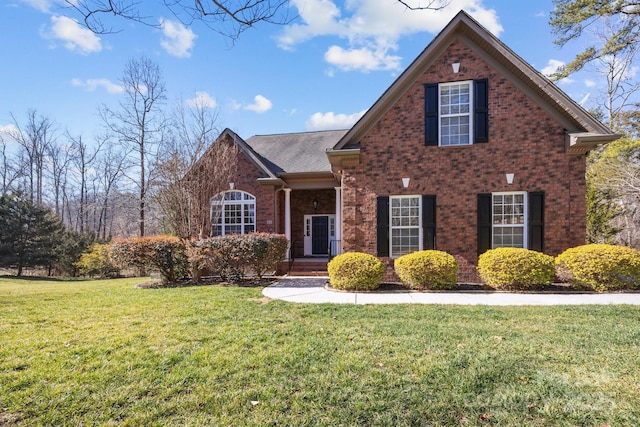 view of property featuring a front yard