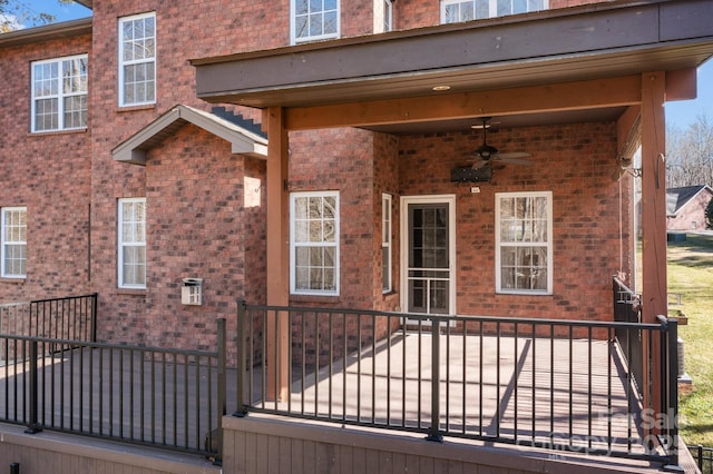 exterior space featuring ceiling fan and a patio area