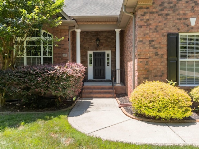 254 Streamside Pl, Mooresville, NC 28115 - entrance to property featuring brick siding and roof with shingles