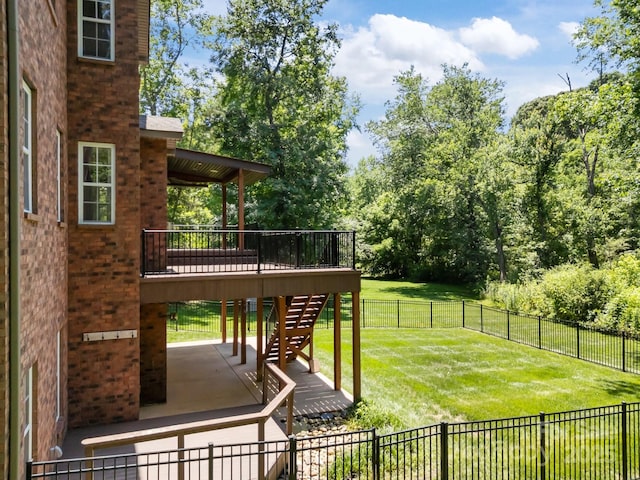 254 Streamside Pl, Mooresville, NC 28115 - fenced backyard with a wooden deck, stairway, and a patio