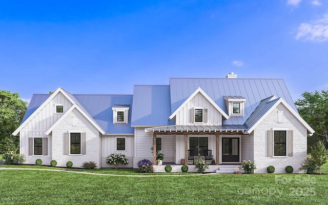 view of front of house featuring a standing seam roof, covered porch, a chimney, and a front lawn