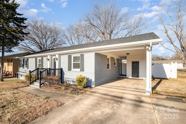 view of front facade with a carport