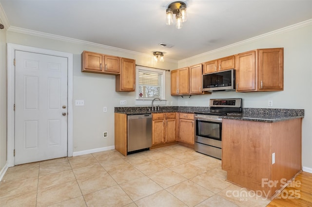 kitchen featuring light tile patterned floors, stainless steel appliances, crown molding, and sink