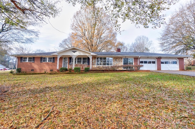 ranch-style house with a porch, a front lawn, and a garage