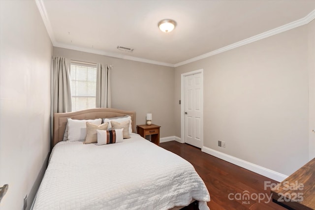 bedroom with dark wood-type flooring and ornamental molding