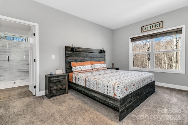 carpeted bedroom with ensuite bath