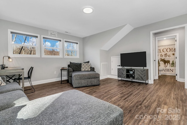 living room featuring dark wood-type flooring