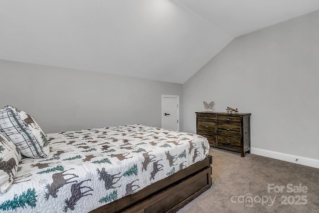 carpeted bedroom featuring vaulted ceiling