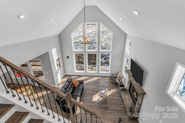 living room featuring dark hardwood / wood-style floors and a notable chandelier