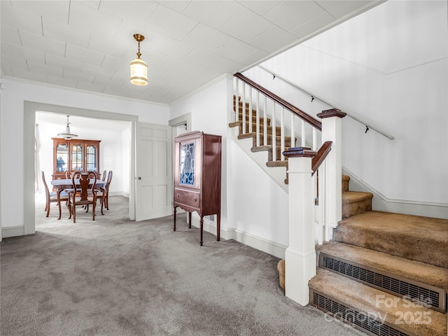 266 Hudlow Rd, Forest City, NC 28043 - stairs featuring crown molding and carpet floors