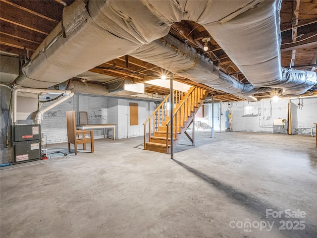 266 Hudlow Rd, Forest City, NC 28043 - unfinished below grade area with stairway, water heater, and heating unit