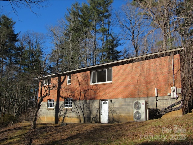 view of home's exterior with ac unit